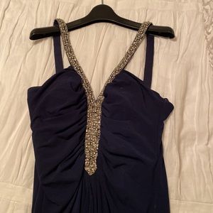 The brand is JS Boutique, it’s a size 10, and it’s color is navy blue.